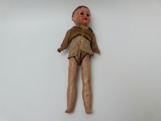 A doll marked W & S to the back,
