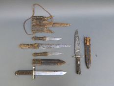 Three knives in crocodile skin sheath, probably Burmese,