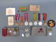 A quantity of WWII medals comprising two 1939-45 medals, two defence medals,