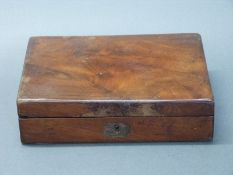A mahogany pistol box with velvet-lined fitted interior to accommodate a pair of percussion pistols