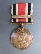 A George V Special Constabulary faithful service medal with long service 1940 clasp,