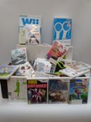Nintendo Wii with approximately 24 games, sports accessories,