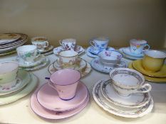 A collection of decorative and collectable trios / cups and saucers including Royal Winton, Aynsley,