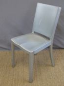 A pair of Emeco by Starck aluminium Hudson chairs