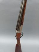 Gunmark Kestrel 20 bore side by side shotgun with scenes of wildlfowl engraved to the locks,