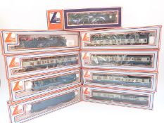 Nine Lima 00 gauge carriages and wagons,