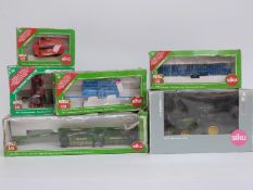 Six Siku 1:32 scale diecast model tractors and farm machinery John Deere 5720 4452,
