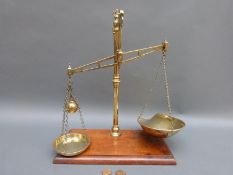 A set of decorative brass scales by Avery & Co,