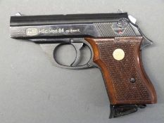 Mauser HSc Model 84 8mm semi automatic blank firing pistol with chequered wooden grips,