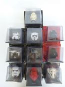 Ten Altaya diecast model Star Wars helmets,