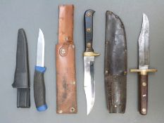Three knives comprising Mortimer & Gascon, Mora and an unnamed example,