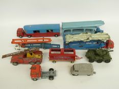 Eight Dinky, Corgi and similar diecast model vehicles including military tank,