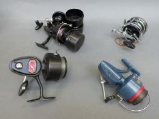 Three fixed spool fishing reels including Mitchell 307, 300 and Match 440A,