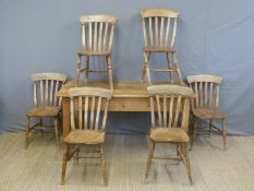 A pine kitchen table and six Windsor country style chairs,