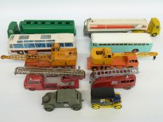 Ten Dinky Toys and Dinky Supertoys diecast model vehicles including fire engines,