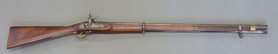 Enfield India pattern percussion hammer action gun with crow stamped to lock, brass trigger guard,