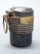 A cylindrical steel grenade with brass band, screw centre section and circular pin, possibly German,