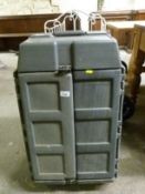 A wheeled three-tier cabinet and contents including spanners