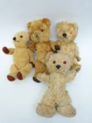 Four blonde mohair Teddy bears all with orange and black glass eyes, and stitched mouths,