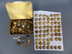 A collection of approximately 60 Borough of Cheltenham gilt buttons and tin containing various