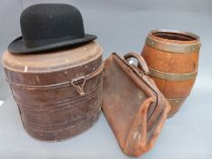 A coopered barrel, Gladstone style bag,