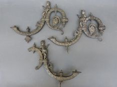 Three figural gas lamp brackets