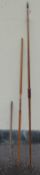 A Victorian longbow with horn fittings together with a similar bow and arrows