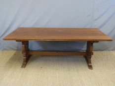 An oak refectory table by Brights of Nettlebed,