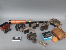 A three draw 'Scouter' telescope by USI London and a quantity of binoculars,
