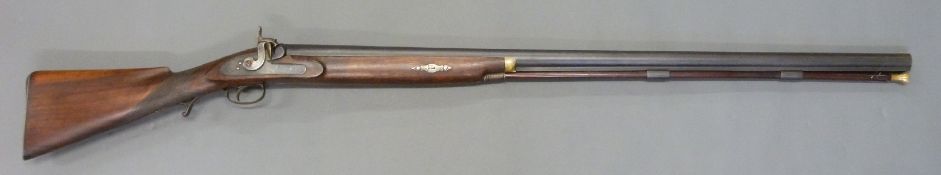 J Towl 6 bore percussion hammer action gun with named and engraved lock, engraved trigger guard,