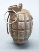 British WWI Mills bomb MK 3 'pineapple' grenade stamped M & P and JGW 917 No 23 M III to base,