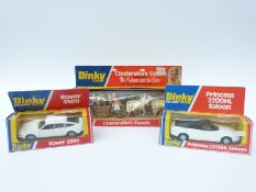 Three Dinky Toys diecast model vehicles comprising Cinderella's Coach 111,
