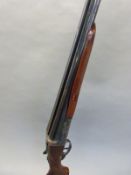 Unnamed 8 bore side by side shotgun with engraved locks, top plate and top lever,