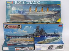 Four Revell and Tamiya model boat kits RMS Titanic 05026, British Vosper MTB 05084,