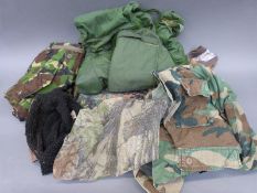 A selection of camouflage clothing suitable for hunting or fishing