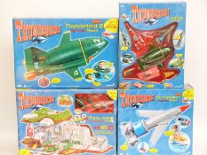 Four Thunderbirds model sets comprising Tracy Island and Thunderbirds 1, 2 and 6 vehicles Super Set,