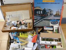 A large collection of mainly 00 gauge accessories including model kits, carriages, buildings,
