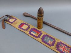 First World War leather belt embroidered with flags of the Allies together with a 1911 shell and a