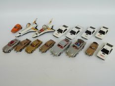 Sixteen Corgi Toys James Bond 007 related diecast model vehicles including Aston Martin DB5,
