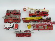 Seven Corgi Major Toys and Dinky Supertoys diecast model fire engines