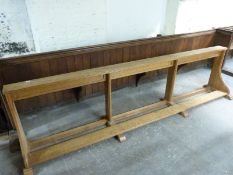 A 20thC light oak prayer rail, ex St Bartholomew's Church, Cam,