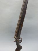 Unnamed 12 bore side by side hammer action shotgun with chequered semi-pistol grip,