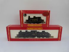 Two Hornby 00 gauge locomotives LMS 4-4-0 Class 2P 579 R2099A and SR 0-6-0 Terrier No 11 R2100,