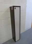 A metal gun safe with keys