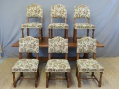 A set of six oak dining chairs with turned H shaped stretchers,