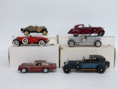 Six Franklin/Danbury Mint diecast model cars including Aston Martin DB5,