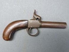 Percussion hammer action pistol with engraved hammer and 2.