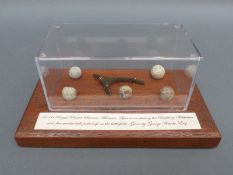 A display consisting of a spur and musket balls from The Battle of Waterloo,