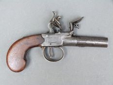 Flintlock hammer action pistol with engraved lock named I Frank,