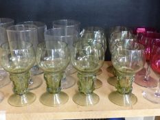 A quantity of various coloured glass goblets etc together with a Caithness paperweight and seven